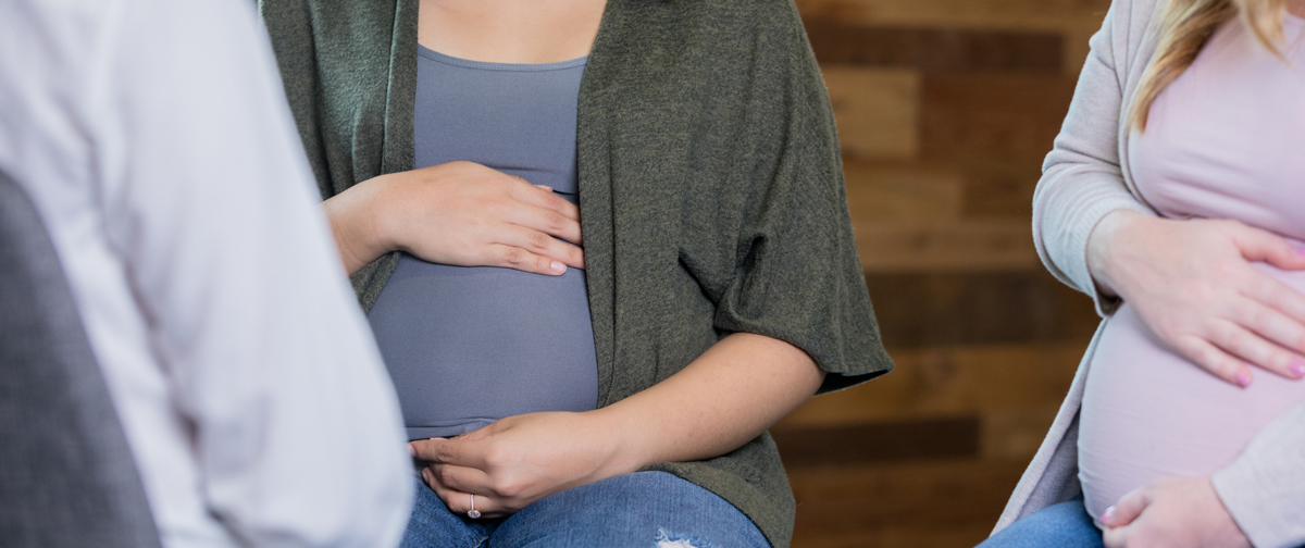 pregnant mothers in a childbirth class