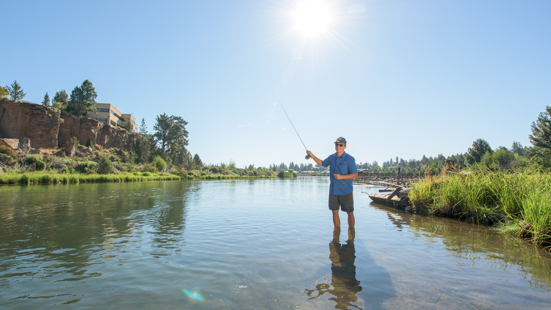 man fly fishing on the Deschutes River in Bend, OR